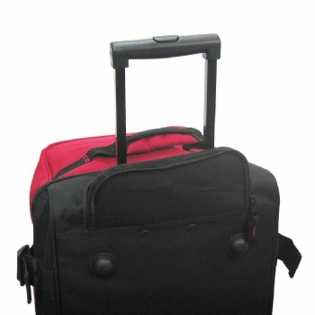 Large travelling luggage dufflebag on wheels with double deckers